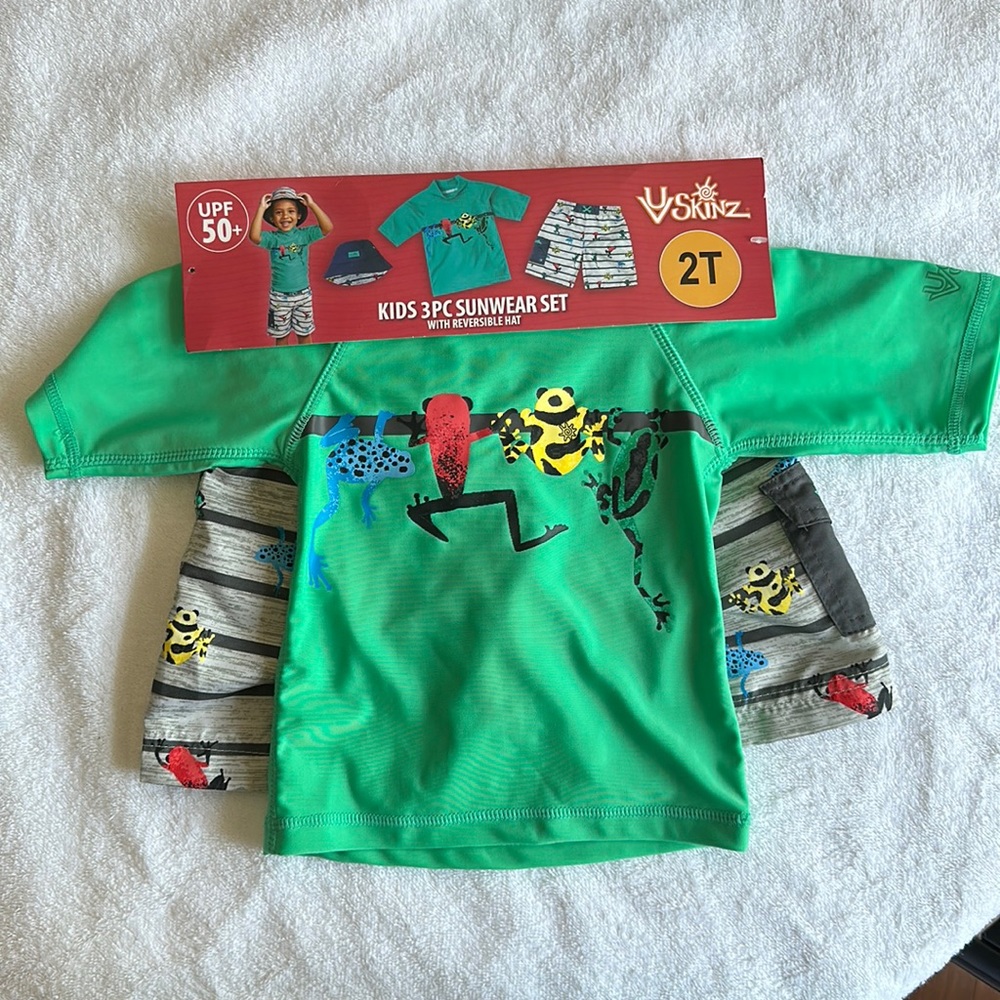 NWT swim trunk and rash guard set